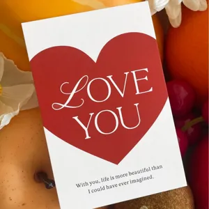 Valentine red heart greeting card with love you text, perfect for gift packing and bakery.