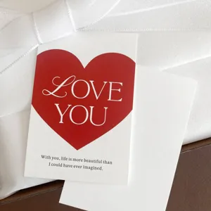 Valentine's Day red heart greeting card with love you text for gift wrapping main view