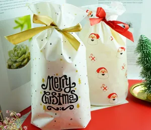 Christmas drawstring plastic gift bags, candy packaging bags with Santa and Merry Christmas print.