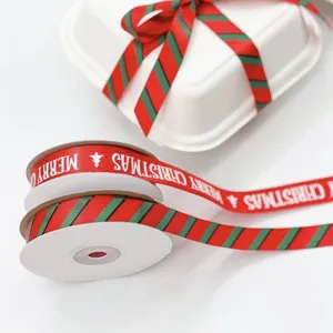 Christmas red and green striped ribbon with Merry Christmas print for gift wrapping.