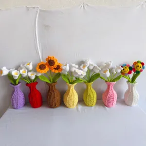 Handmade crochet flower potted plant with yarn vase, cute knitted bouquet decor for home.