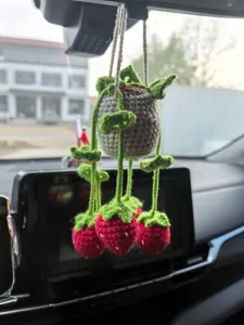 Handmade crochet car hanging ornament, potted strawberry plant for rearview mirror interior decor.