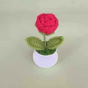 Handmade crochet red rose potted plant detail view, perfect cute indoor desk decoration item.