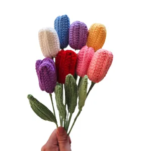 Handmade crochet tulip bouquet detail showing colorful knitted woolen flower craftsmanship close up