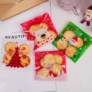 Weihnachts-Kekstüte Set, mit süßem Cartoon-Bär und Weihnachtsmann-Design für Geschenke.