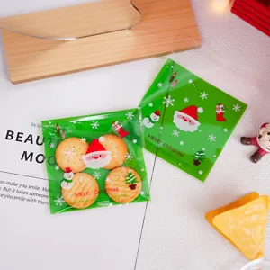 Weihnachtskekse und Suesswaren Verpackungsbeutel Detailansicht, gruene Geschenktueten.