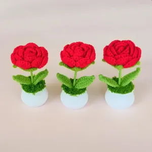 Handcrafted crochet red rose potted plant, charming desktop decoration for home office gift.