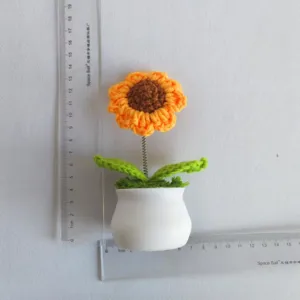 Handcrafted crochet sunflower potted plant with spring shaking design, cute desktop decor.
