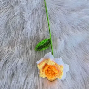 Handmade crochet flower detail, beautiful knitted yarn rose stem for home decor and gifts.