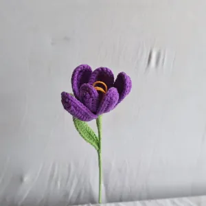 Handcrafted crochet purple flower stem gift, exquisite knitted artificial botanical decor.