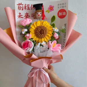 Handmade crochet graduation sunflower bouquet detail, cute doll with mortarboard, pink wrap.