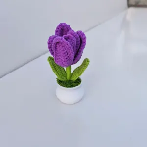 Handmade crochet tulip potted plant detail, cute purple knit flower for home decor and gifts.