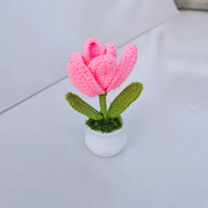 Handcrafted crochet pink tulip potted plant detail view, perfect for home decor and gifting.