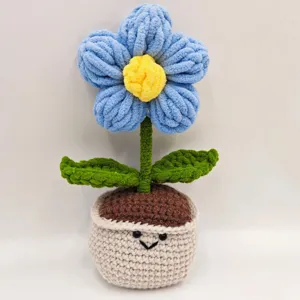 Handmade crochet blue puff flower potted plant with cute smile face home decor gift