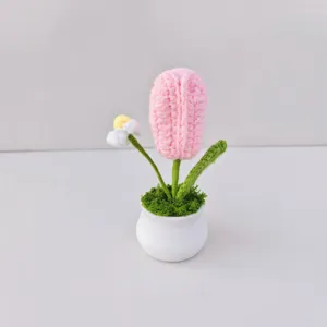 Handmade crochet pink tulip potted plant detail, cute wool flower decor for cozy home aesthetic.