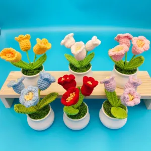 Handmade crochet potted flowers, colorful knit tulip desk decor, cute miniature plant display.