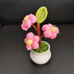Handcrafted crochet potted flower desktop ornament detail view, perfect cute car decor.