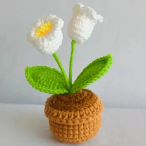 Handmade crochet double-head lily of the valley potted plant, perfect home decor gift.