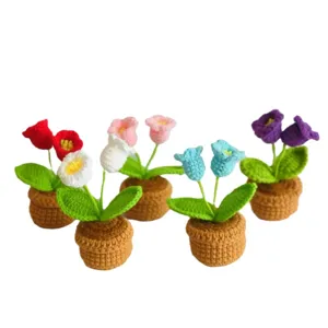 Handmade crochet lily of the valley potted plant, colorful woven flower home decor main view.