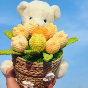 Handmade crochet bear holding colorful tulip bouquet basket for home decor and gifts
