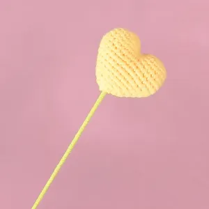Handmade crocheted yellow heart flower stem DIY craft home decor accessory main image