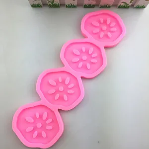 Stampo in silicone rosa a quattro cavità con radice di loto per dolci, fondente e ghiaccio.
