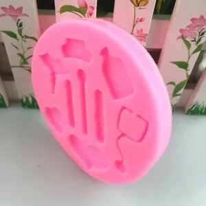 Pink silicone mold with nurse medical tools design for chocolate cake baking detail view