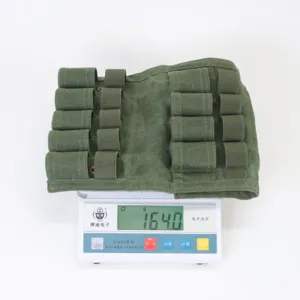 Pochette porte-munitions tactique en toile verte, accessoire de rangement de camping.