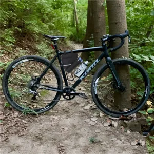 Waterproof mountain bike triangle bag with reflective strip for bicycle frame storage.