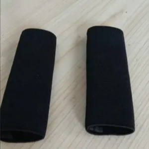 Detailed view of black tactical belt sleeve showing durable nylon strap construction.