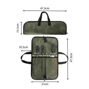 Sac de rangement portable en toile pour couteaux de chef avec fentes et fermeture éclair.