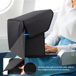Black laptop privacy shield sun visor with adjustable double-row velcro for travel use.