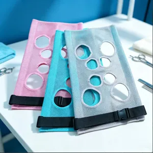 Dog grooming hammock breathable mesh pet harness with leg holes for safe bath nail trimming.