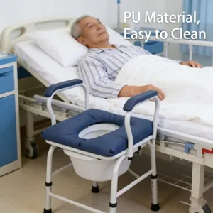 Detailed view of the portable bedside commode chair with comfortable waterproof PU cushion.