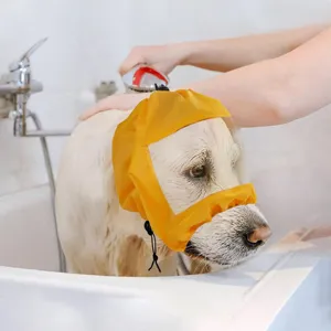 Close-up detail of the transparent dog waterproof bathing cap, protecting ears during bath time.