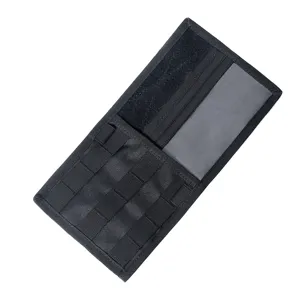 Tactical car sun visor organizer detail view, black oxford tactical pouch with elastic loops.