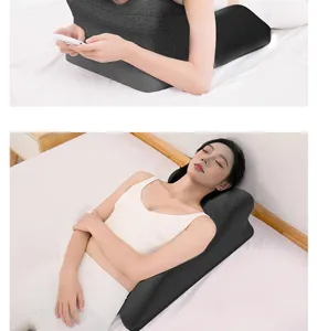 Ergonomic bed wedge positioning pillow for comfortable resting and body support in bedroom.