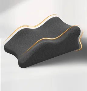 Detailed view of the ergonomic dark grey support cushion showing its wave shape and soft fabric.