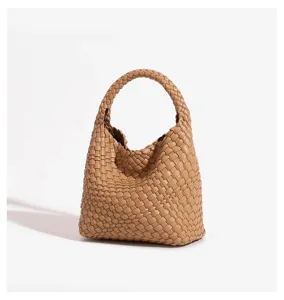 Leather woven handbag detail shot, exquisite craftsmanship, premium texture for daily commuter use.