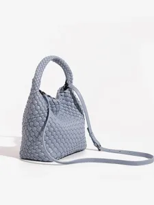 Light blue leather woven crossbody bag, stylish women hand bag for daily commute and travel.