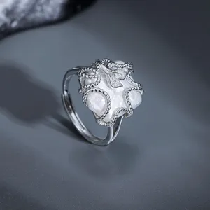 Elegant 925 silver baroque pearl ring featuring unique geometric square design and delicate twisted.