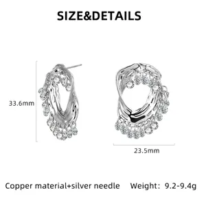 Boucles d'oreilles pendantes à franges irrégulières en cuivre avec aiguille en argent.