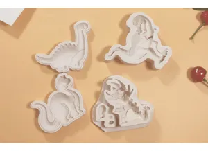 Set of 4 cartoon dinosaur silicone molds for DIY fondant, chocolate, and cake decoration.
