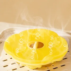 Silicone steam mold for baby food, cute flower shape with multi vents for easy baking.