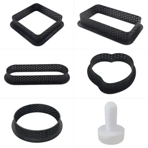 Set of multi-shape perforated baking tart rings including square, heart, and circle tools.