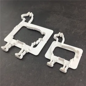 Detailed shot of cute plastic alpaca shape cookie cutters and fondant baking molds set.