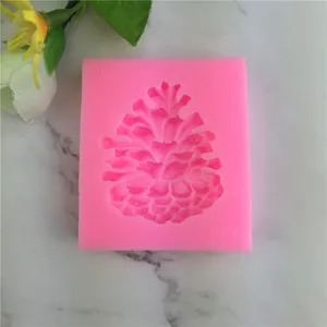 Detailed shot of the pink silicone pinecone mold texture, perfect for DIY cake decorating.