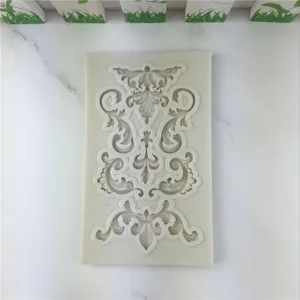 Detailed view of the vintage baroque scrollwork silicone mold for cake fondant decorating tools.
