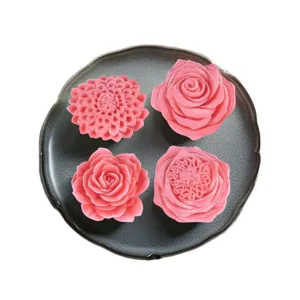 Silicone mold set featuring four elegant pink flower designs for delicious DIY mousse cakes.