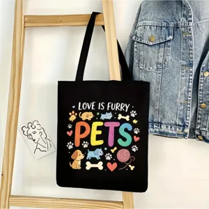 Bolso tote de lona negra con lindo estampado de mascotas coloridas, ideal para uso diario.